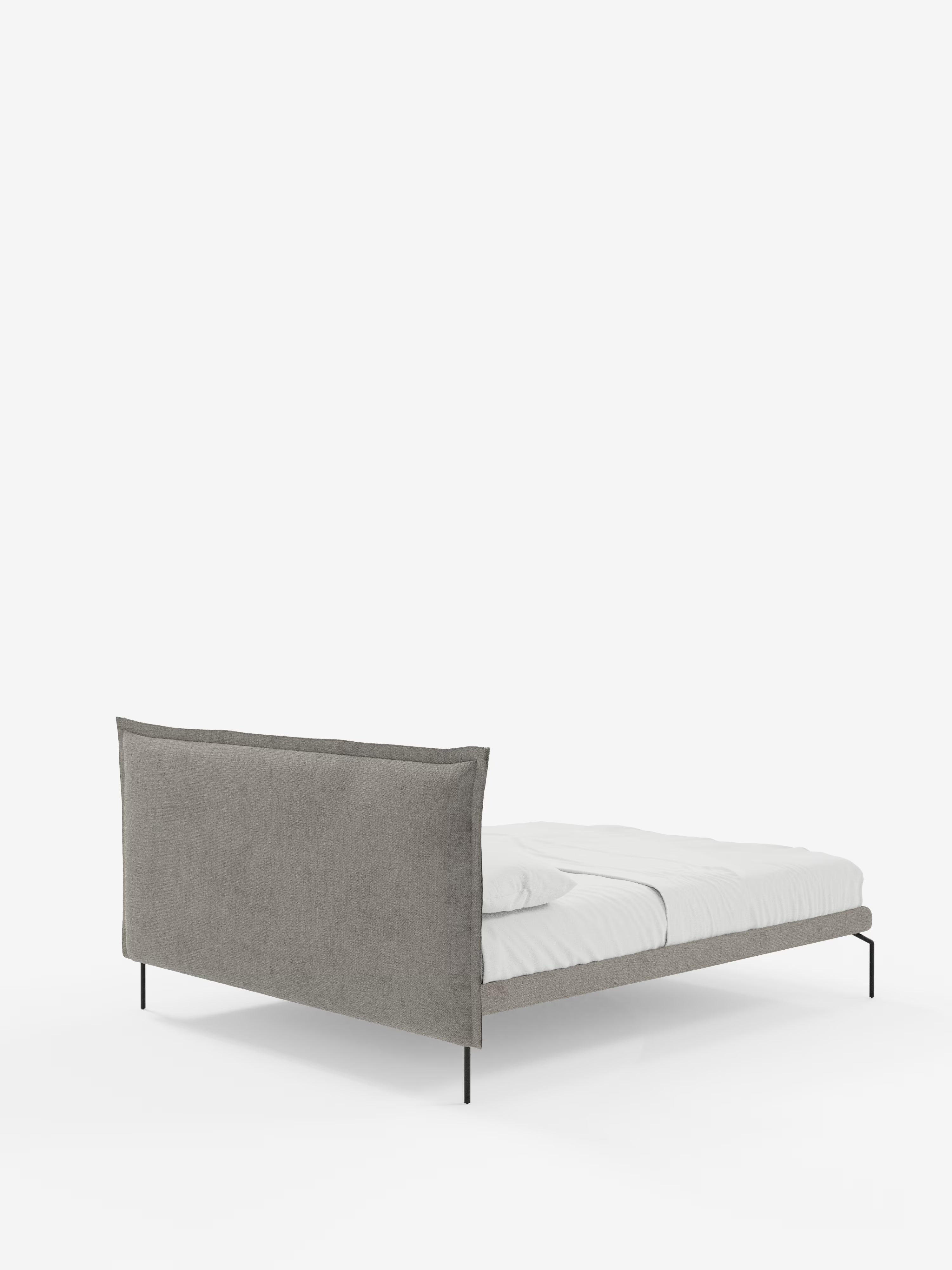Eric Upholstered removable cover bed with steel legs in stain-resistant fabric
