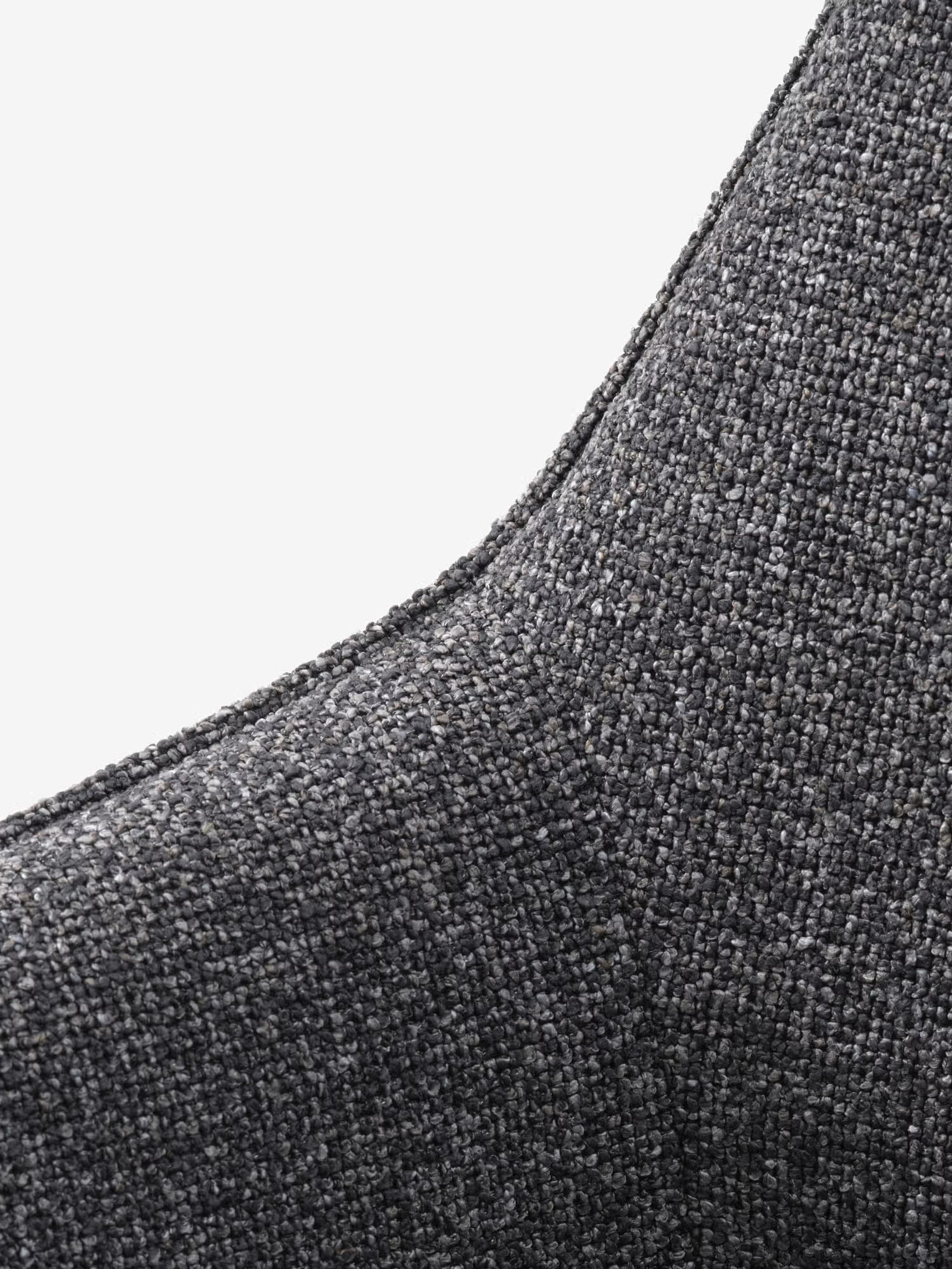 Alma silla giratoria tapizada en tela bouclé melange con base de metal negro