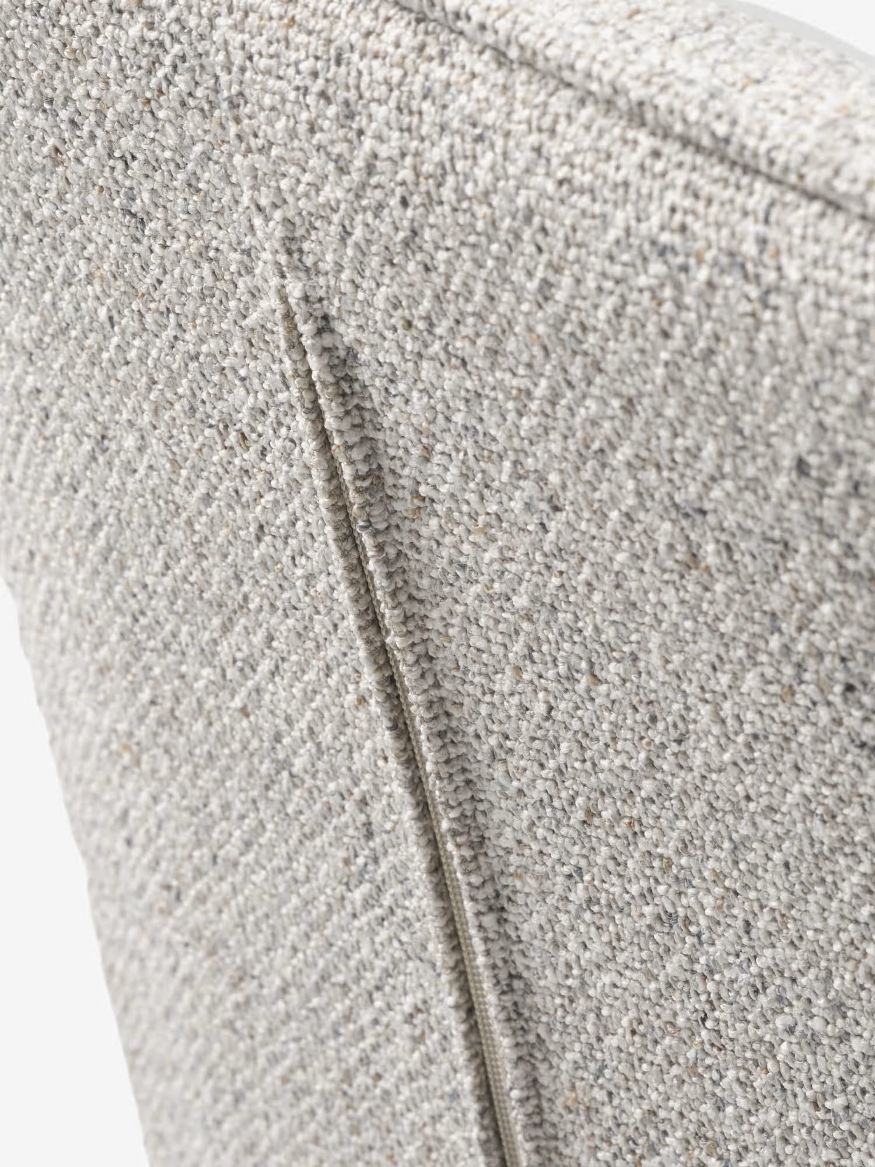 Alma silla giratoria tapizada en tela bouclé melange con base de metal negro