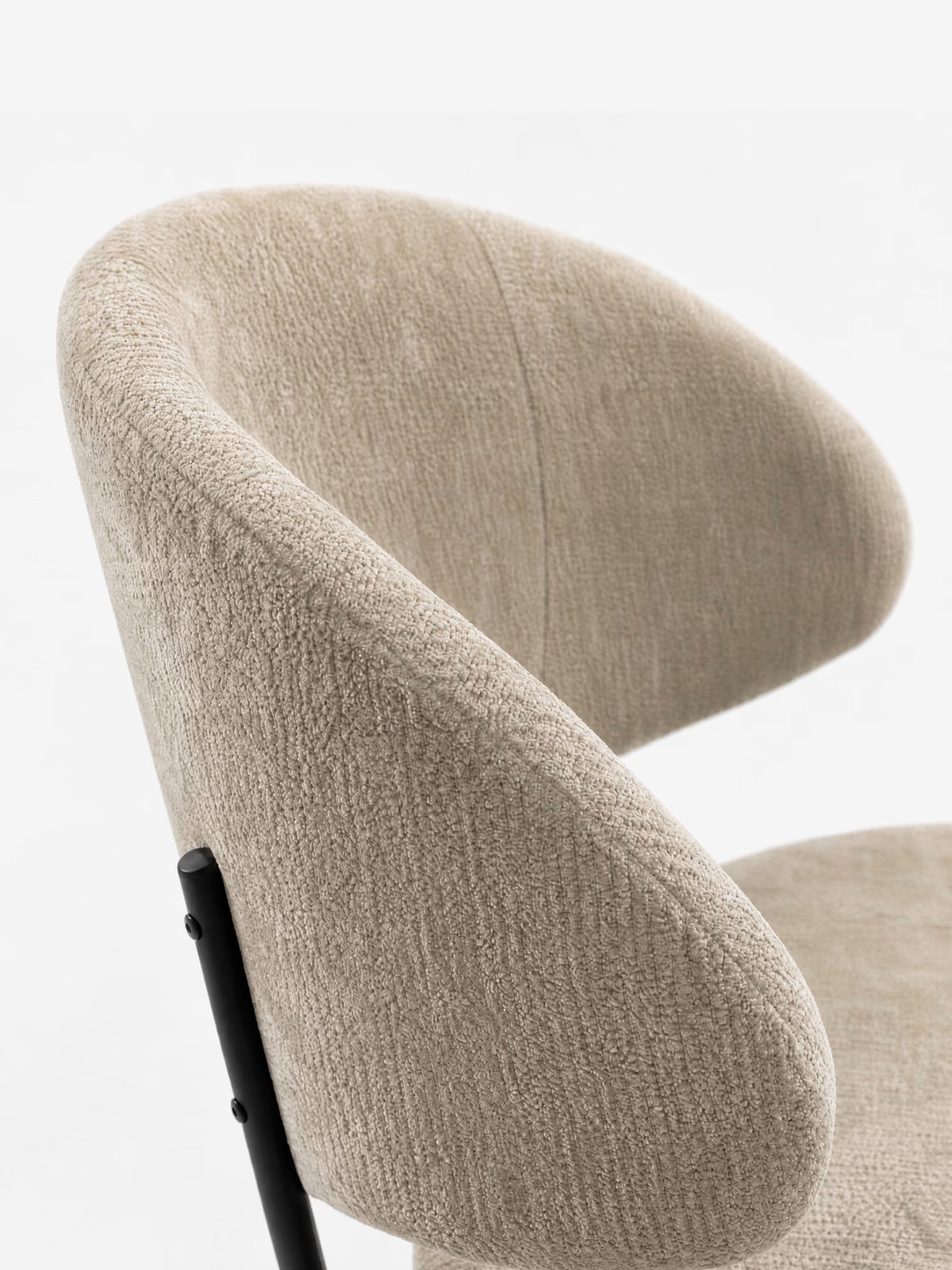Bruma chair in elegant grey fabric with black metal legs - minimalist design and wraparound backrest