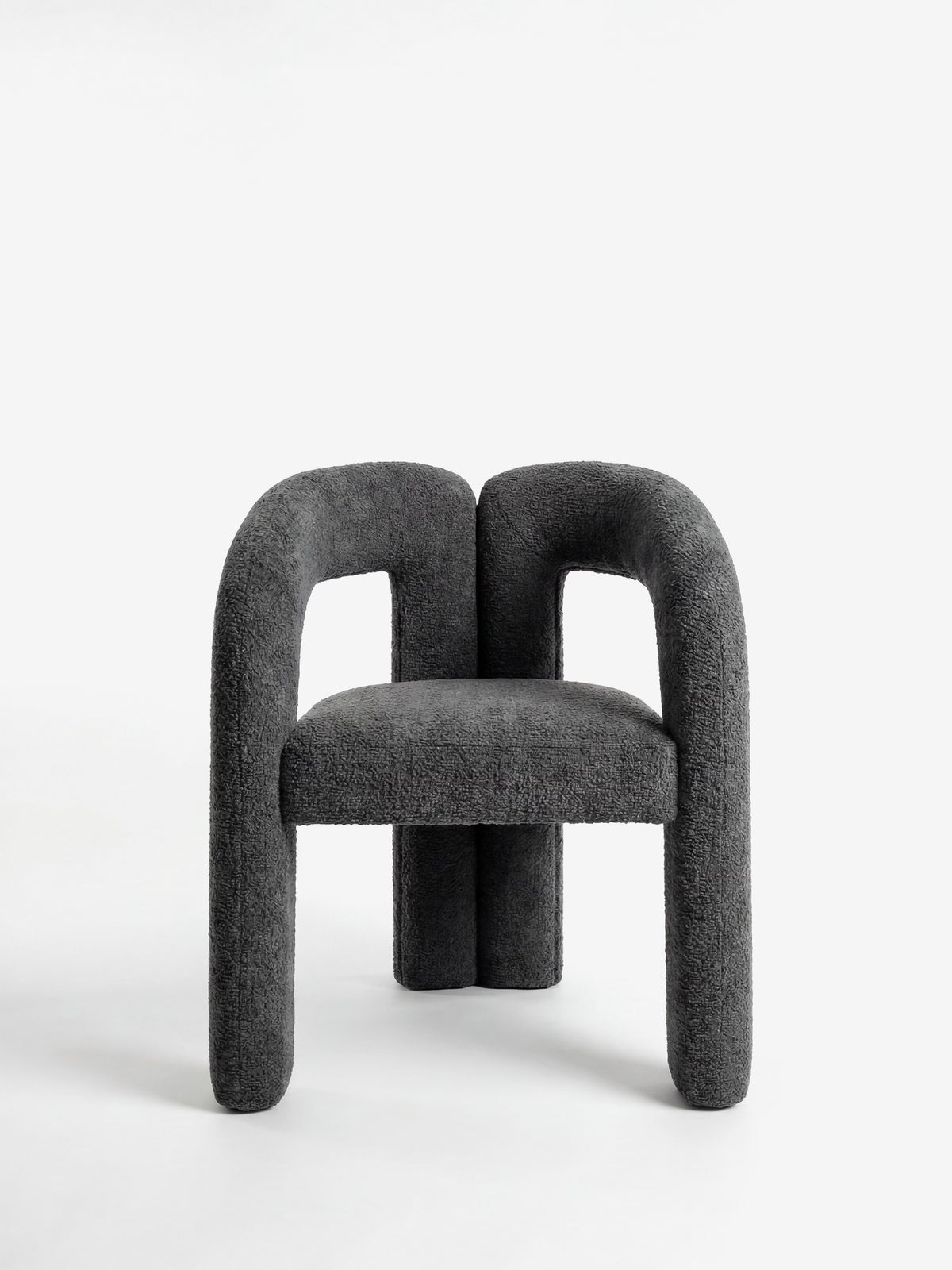 Sibilla upholstered green chenille fabric designer chair with upholstered frame and arch shape