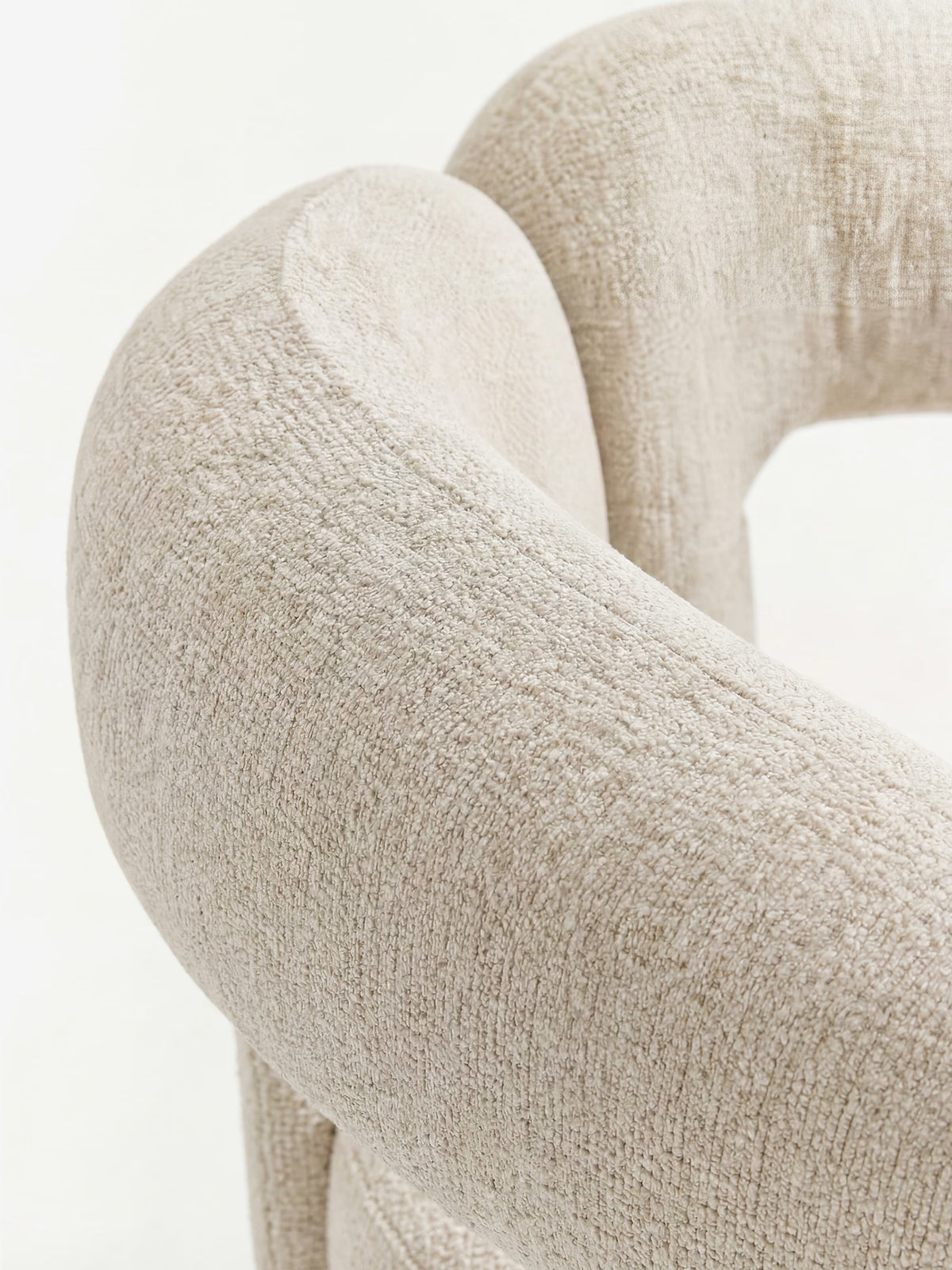 Sibilla upholstered green chenille fabric designer chair with upholstered frame and arch shape
