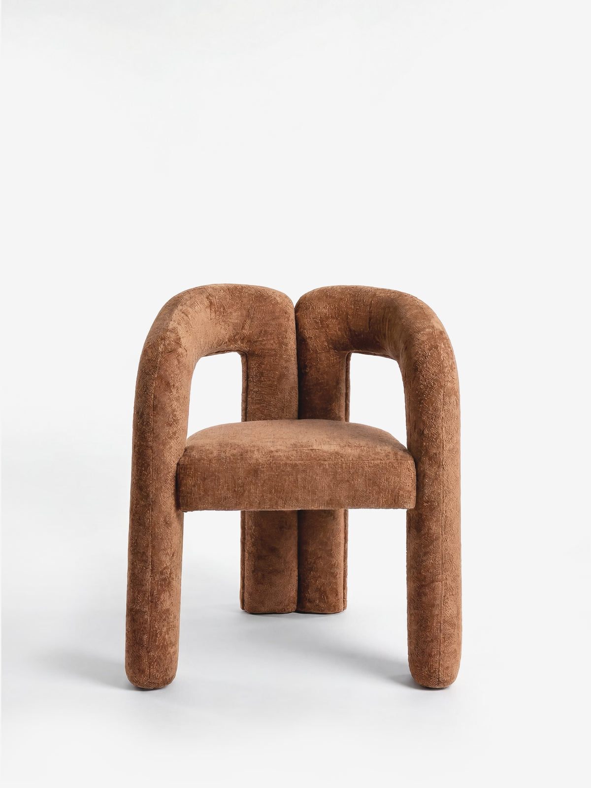 Sibilla upholstered green chenille fabric designer chair with upholstered frame and arch shape