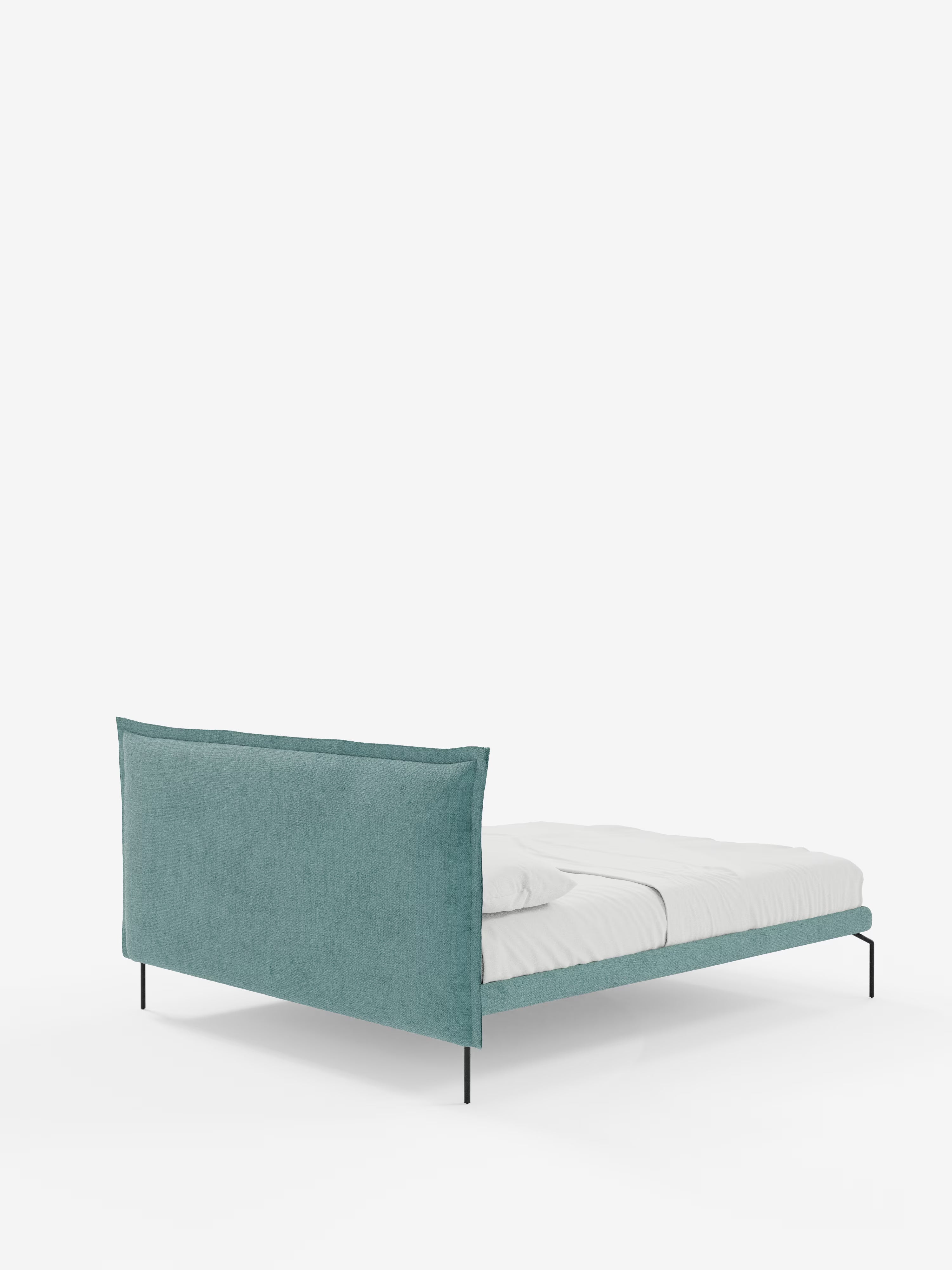Eric Upholstered removable cover bed with steel legs in stain-resistant fabric