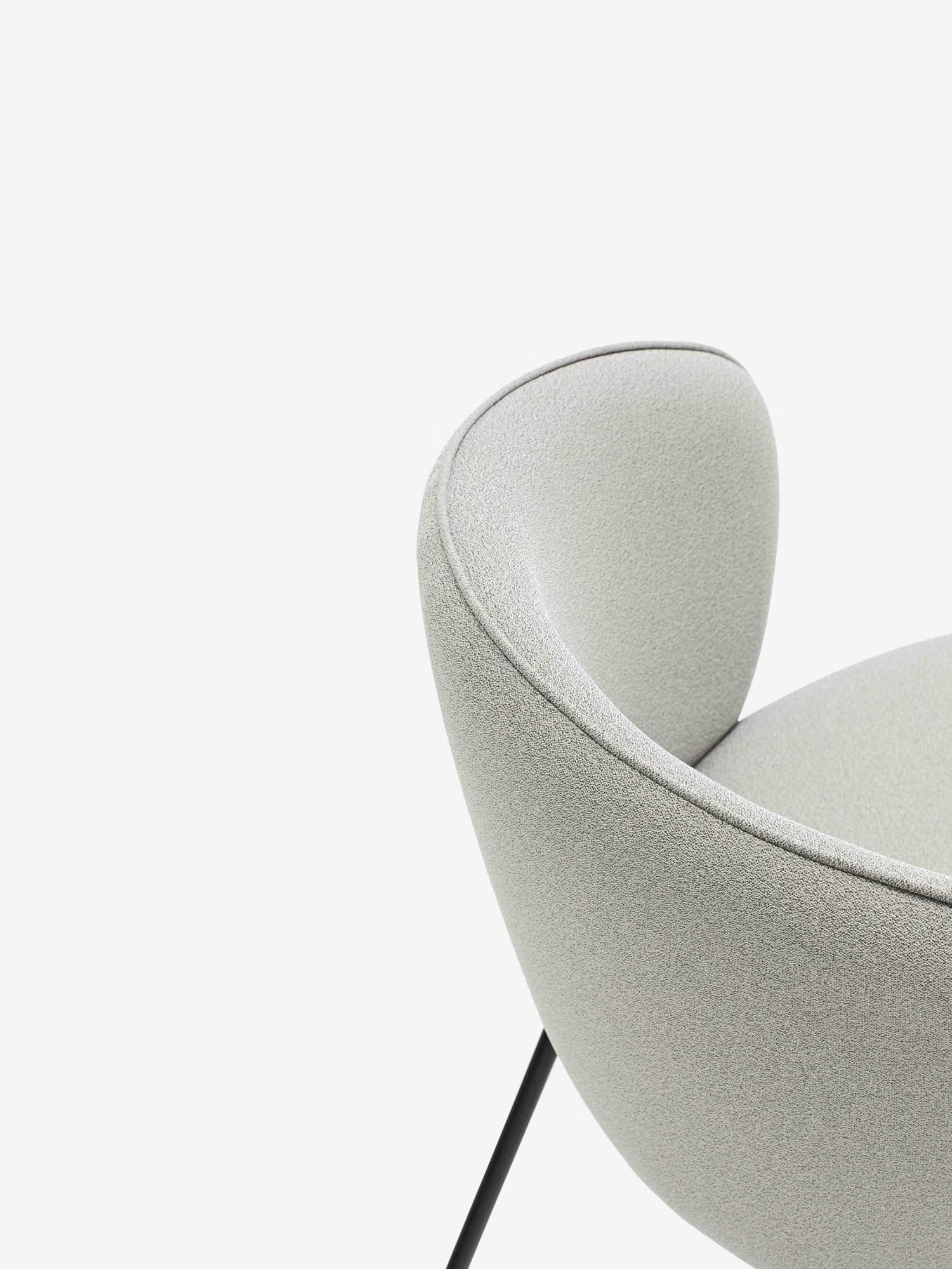 Add Silla tapizada en tejido reciclado y sostenible con diseño ergonómico