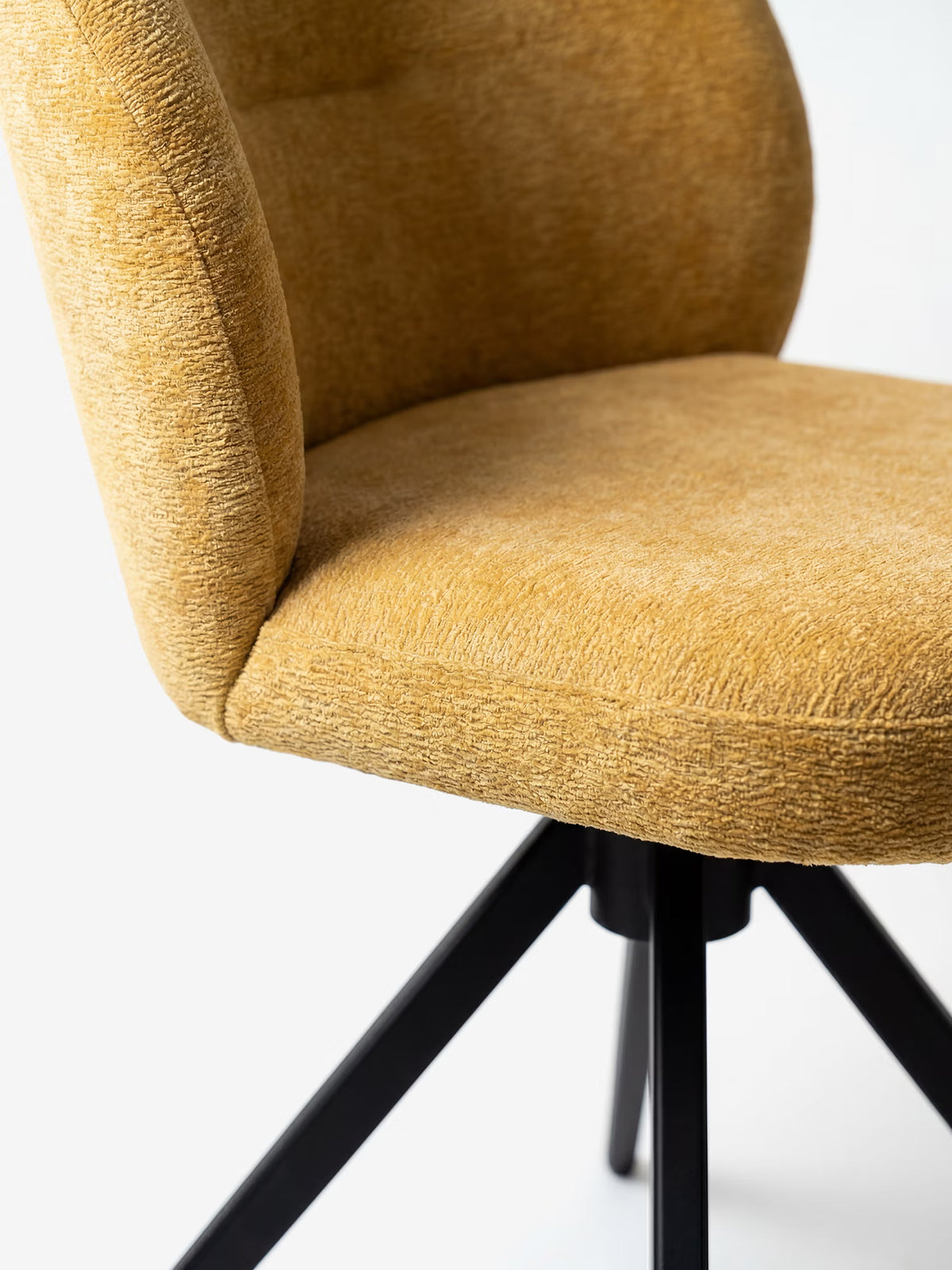 Alba upholstered chair in soft ochre yellow fabric with black metal base