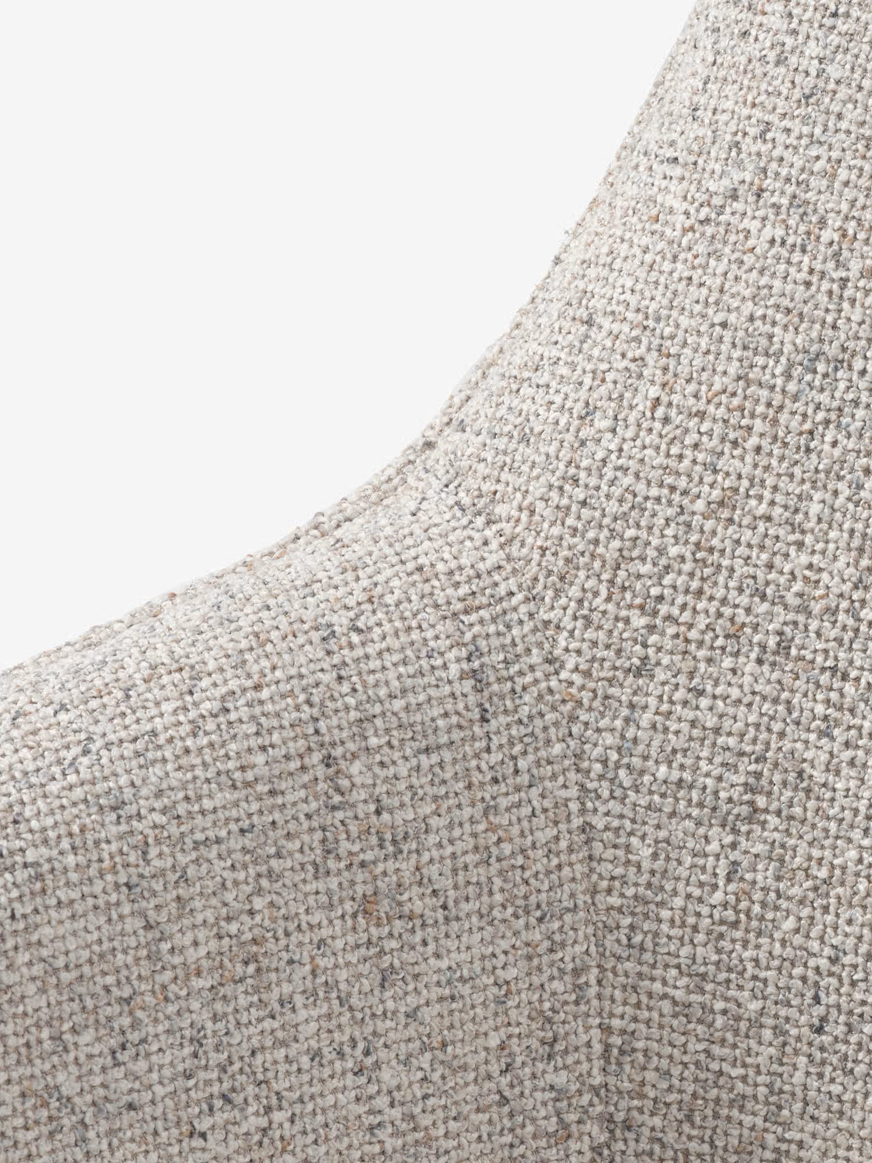 Alma silla giratoria tapizada en tela bouclé melange con base de metal negro