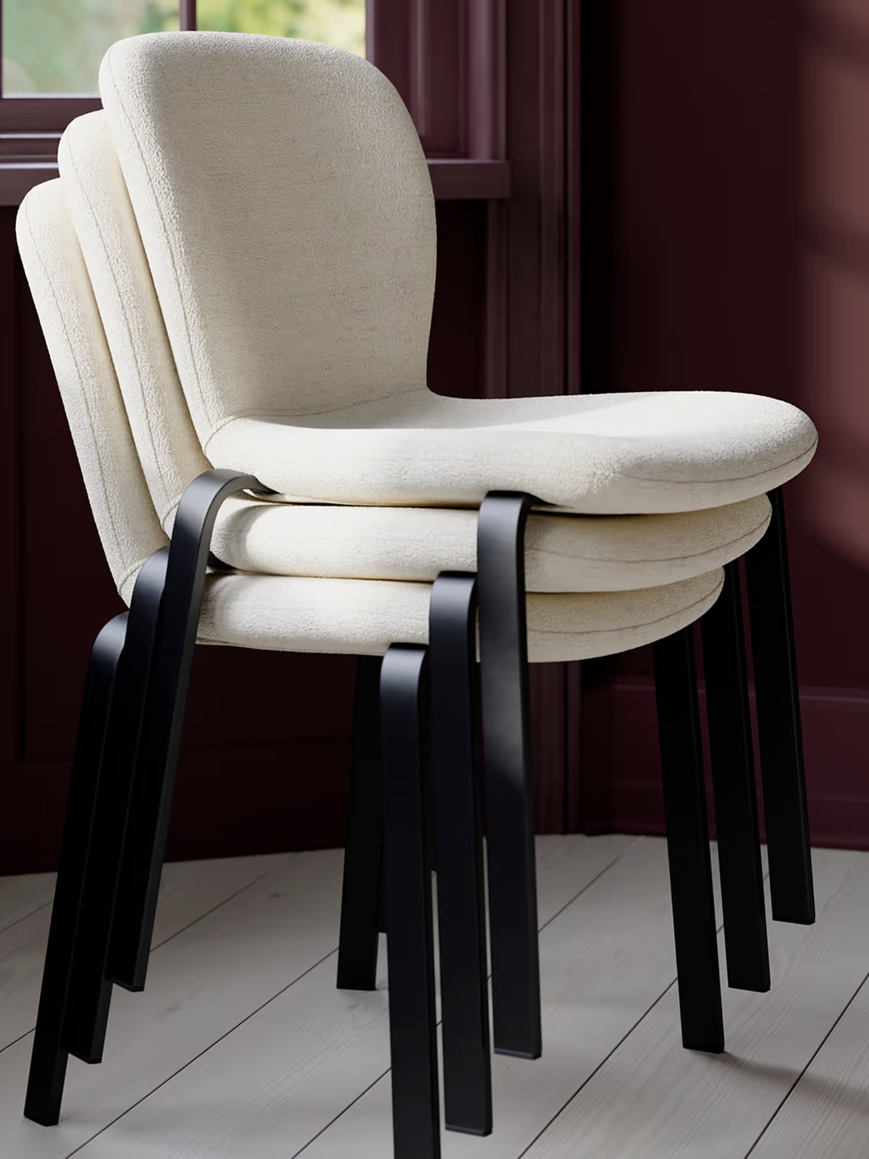 Heap Modern stackable chair - padded in bouclé with metal frame