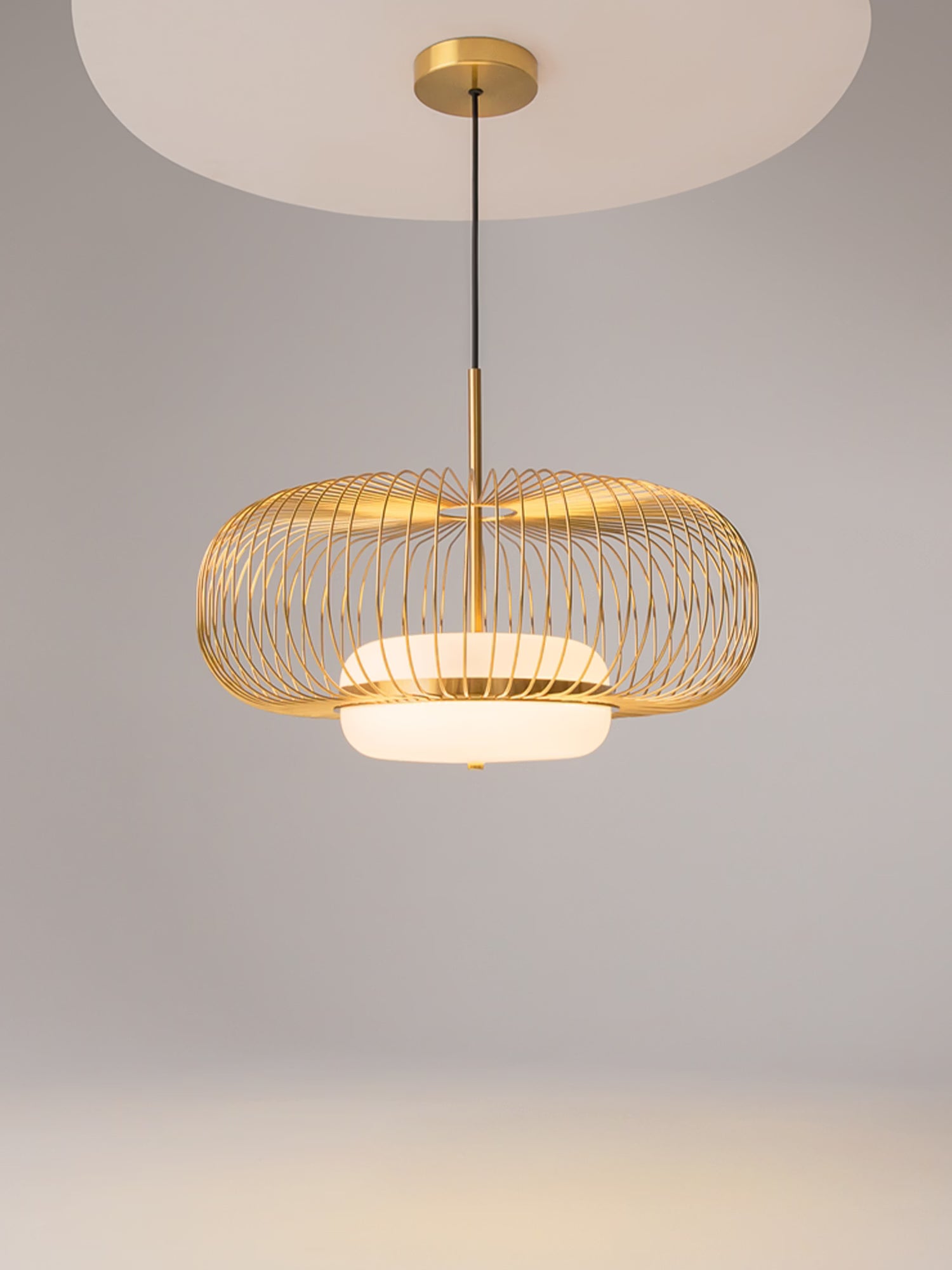 Levitation Brass finish metal pendant lamp with glass diffuser Ø50 cm