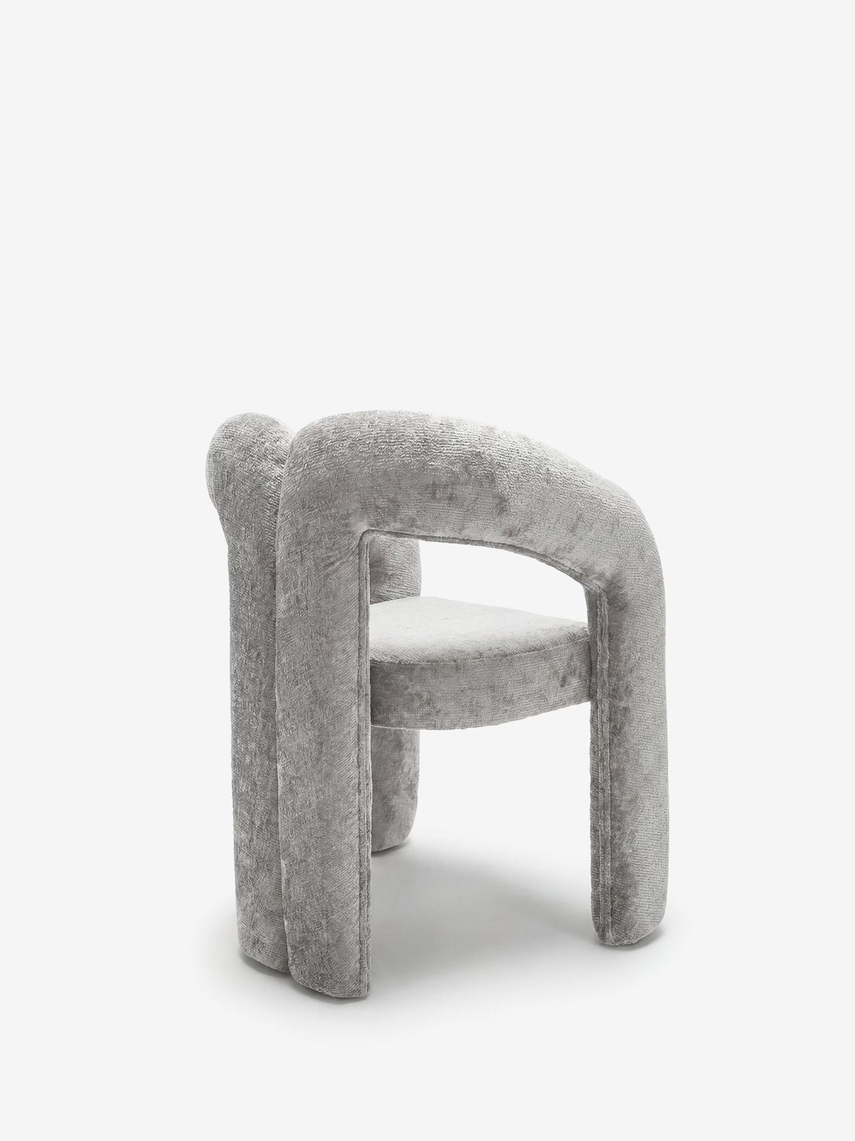Sibilla upholstered green chenille fabric designer chair with upholstered frame and arch shape