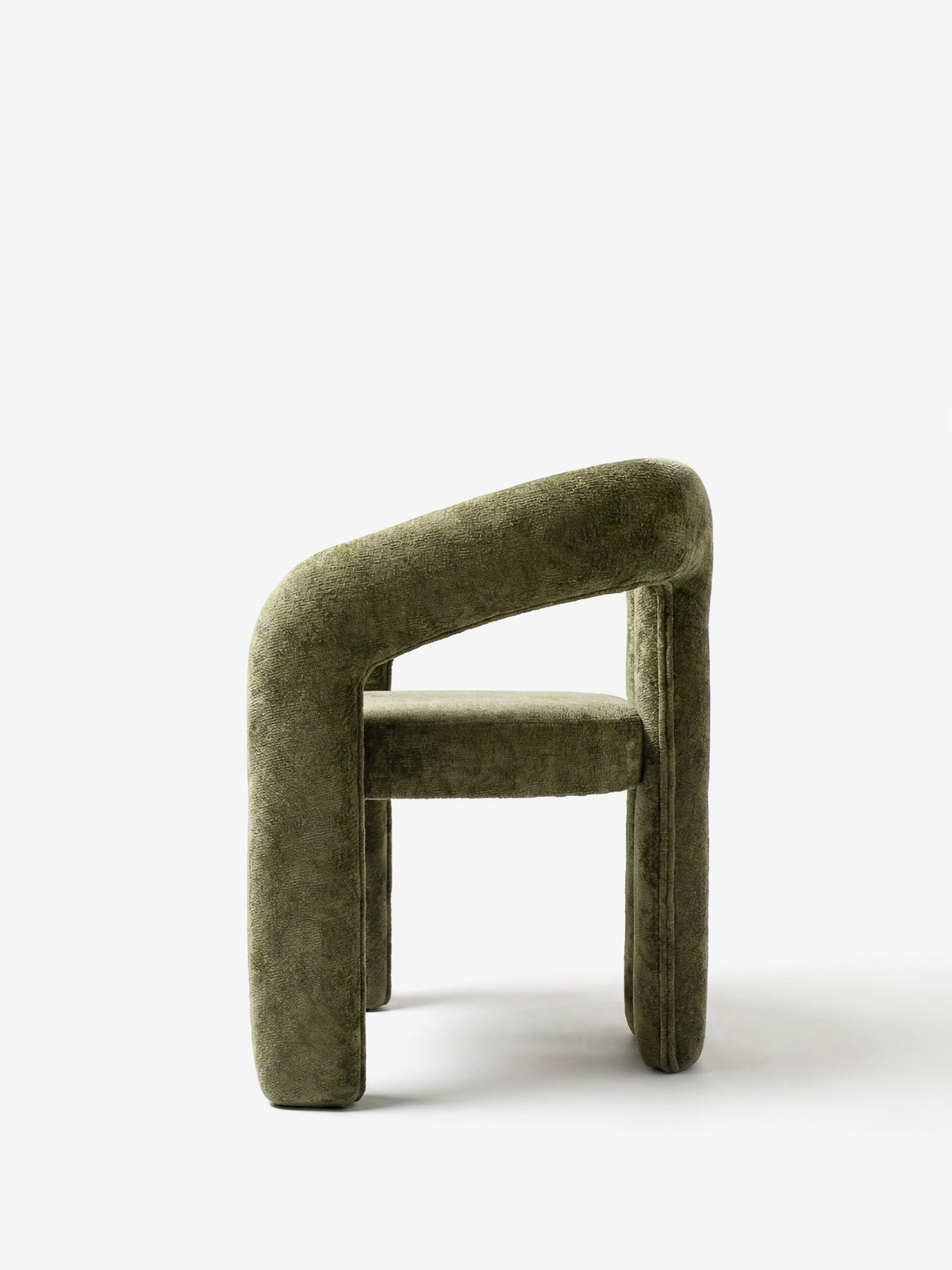 Sibilla upholstered green chenille fabric designer chair with upholstered frame and arch shape